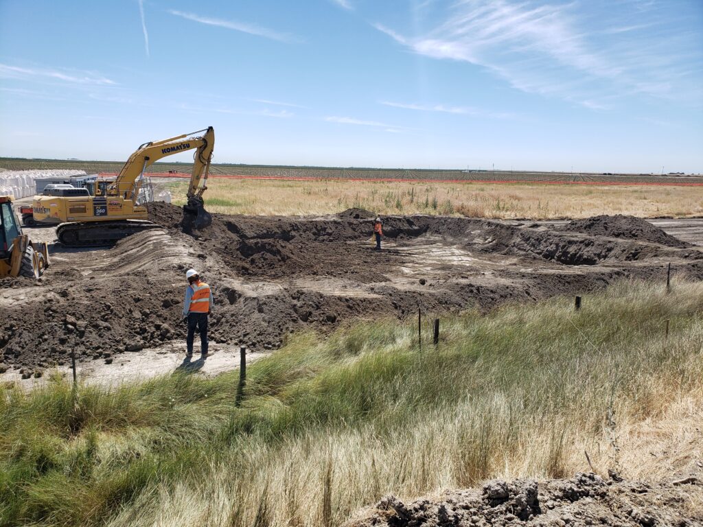 Construction crews then prepped the levee and installed concrete-reinforced culverts to replace aged corrugated metal culverts.